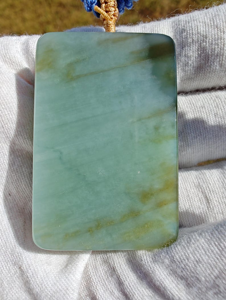Handmade Siberian Nephrite Jade Pendant: Certified Patterned Stone