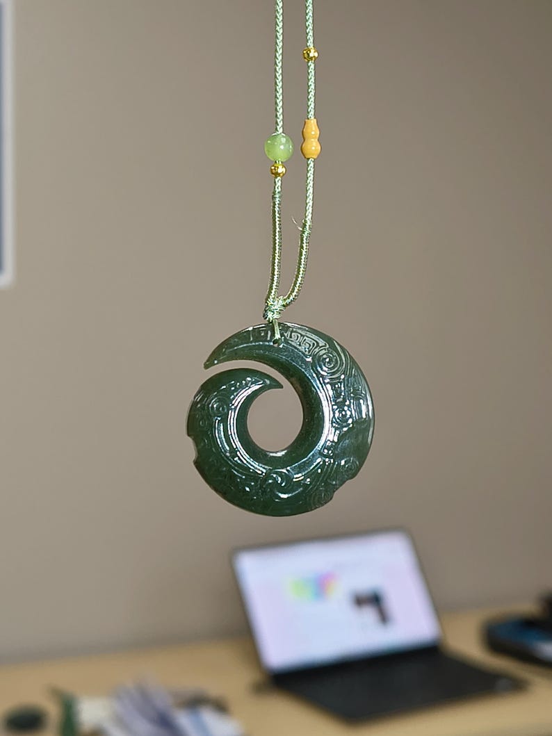 Kunlun Dark Green Nephrite Jade Spiral Pendant – Intricate Engraved Jade Necklace